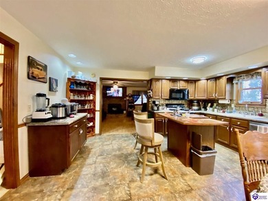 Lakefront Home with 2 Docks on 3 lots totaling 3.43 acres. Docks on Rough River Dam State Resort Park Golf Course in Kentucky - for sale on GolfHomes.com, golf home, golf lot