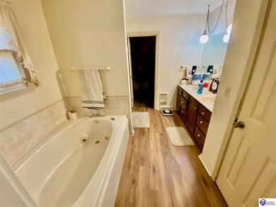 Lakefront Home with 2 Docks on 3 lots totaling 3.43 acres. Docks on Rough River Dam State Resort Park Golf Course in Kentucky - for sale on GolfHomes.com, golf home, golf lot