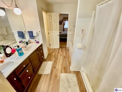 Lakefront Home with 2 Docks on 3 lots totaling 3.43 acres. Docks on Rough River Dam State Resort Park Golf Course in Kentucky - for sale on GolfHomes.com, golf home, golf lot