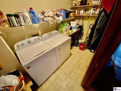 Lakefront Home with 2 Docks on 3 lots totaling 3.43 acres. Docks on Rough River Dam State Resort Park Golf Course in Kentucky - for sale on GolfHomes.com, golf home, golf lot