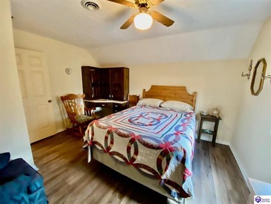 Lakefront Home with 2 Docks on 3 lots totaling 3.43 acres. Docks on Rough River Dam State Resort Park Golf Course in Kentucky - for sale on GolfHomes.com, golf home, golf lot