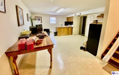 Lakefront Home with 2 Docks on 3 lots totaling 3.43 acres. Docks on Rough River Dam State Resort Park Golf Course in Kentucky - for sale on GolfHomes.com, golf home, golf lot