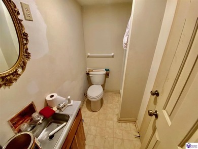 Lakefront Home with 2 Docks on 3 lots totaling 3.43 acres. Docks on Rough River Dam State Resort Park Golf Course in Kentucky - for sale on GolfHomes.com, golf home, golf lot