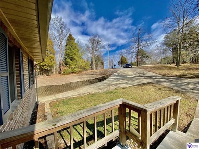 Lakefront Home with 2 Docks on 3 lots totaling 3.43 acres. Docks on Rough River Dam State Resort Park Golf Course in Kentucky - for sale on GolfHomes.com, golf home, golf lot