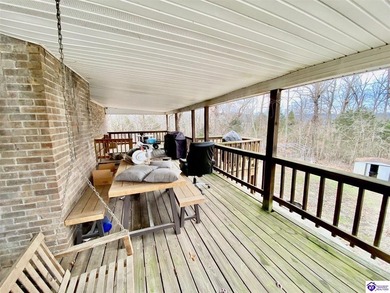 Lakefront Home with 2 Docks on 3 lots totaling 3.43 acres. Docks on Rough River Dam State Resort Park Golf Course in Kentucky - for sale on GolfHomes.com, golf home, golf lot