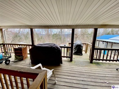 Lakefront Home with 2 Docks on 3 lots totaling 3.43 acres. Docks on Rough River Dam State Resort Park Golf Course in Kentucky - for sale on GolfHomes.com, golf home, golf lot