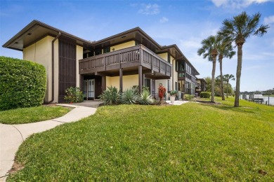 Step into this beautifully detailed 2-bedroom, 2-bath condo on Palm Harbor Golf Club in Florida - for sale on GolfHomes.com, golf home, golf lot