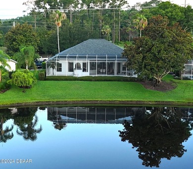 You're not just buying a house-you're signing up for a lifestyle on Plantation Bay Golf and Country Club in Florida - for sale on GolfHomes.com, golf home, golf lot