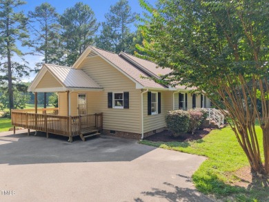 Wonderful single story home with views of beautiful Kerr Lake on Kerr Lake Country Club in North Carolina - for sale on GolfHomes.com, golf home, golf lot