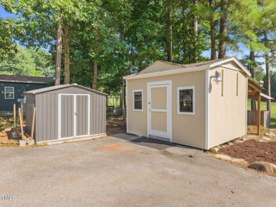 Wonderful single story home with views of beautiful Kerr Lake on Kerr Lake Country Club in North Carolina - for sale on GolfHomes.com, golf home, golf lot