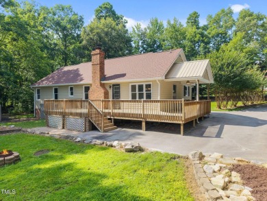 Wonderful single story home with views of beautiful Kerr Lake on Kerr Lake Country Club in North Carolina - for sale on GolfHomes.com, golf home, golf lot