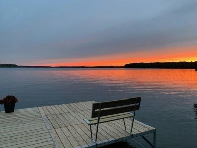 North Shore of Tomahawk Lake Home on Minocqua Country Club in Wisconsin - for sale on GolfHomes.com, golf home, golf lot