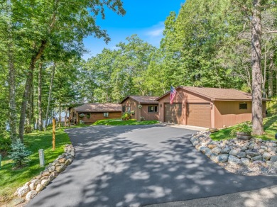 North Shore of Tomahawk Lake Home on Minocqua Country Club in Wisconsin - for sale on GolfHomes.com, golf home, golf lot