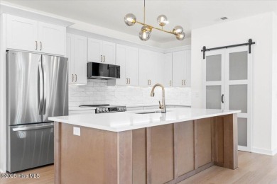 Welcome to 355 S Middleton Dr NW, a stunning new construction on Brunswick Plantation and Golf Resorts in North Carolina - for sale on GolfHomes.com, golf home, golf lot