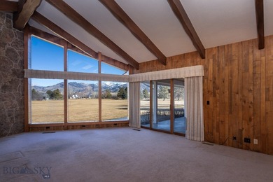 Spectacular views of the Bridger Mountain Range from this home on Riverside Country Club in Montana - for sale on GolfHomes.com, golf home, golf lot