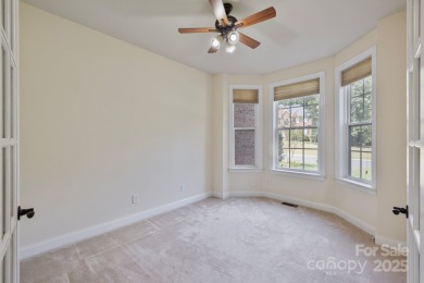 Situated on a coveted corner lot beside the 17th green in Olde on Olde Sycamore Golf Plantation in North Carolina - for sale on GolfHomes.com, golf home, golf lot