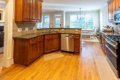 Welcome to this beautifully maintained 4 bedroom, 2.5 bath home on Heritage Golf Club in North Carolina - for sale on GolfHomes.com, golf home, golf lot