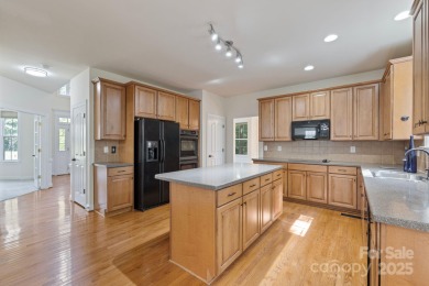 Situated on a coveted corner lot beside the 17th green in Olde on Olde Sycamore Golf Plantation in North Carolina - for sale on GolfHomes.com, golf home, golf lot