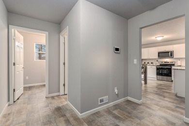 Welcome to this spacious 4-bedroom, 2.5-bath set on nearly half on Lake Doster Golf Club in Michigan - for sale on GolfHomes.com, golf home, golf lot
