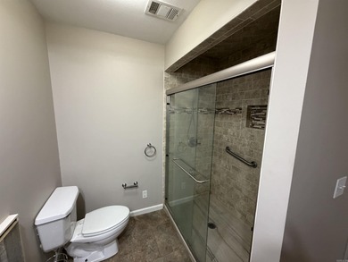 Welcome to 980 Dogwood Drive, where comfort, space, and location on Sugar Creek Country Club in Arkansas - for sale on GolfHomes.com, golf home, golf lot