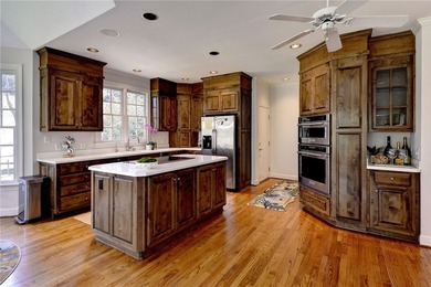 Step into this charming all-brick home nestled on a beautiful on Two Rivers Country Club in Virginia - for sale on GolfHomes.com, golf home, golf lot