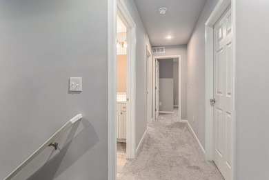 Welcome to this spacious 4-bedroom, 2.5-bath set on nearly half on Lake Doster Golf Club in Michigan - for sale on GolfHomes.com, golf home, golf lot