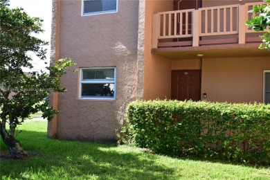 Large 1st Floor corner unit.  Privateplete impact glass on Sunrise Lakes Phase III in Florida - for sale on GolfHomes.com, golf home, golf lot