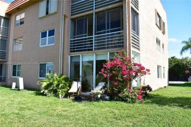 Large 1st Floor corner unit.  Privateplete impact glass on Sunrise Lakes Phase III in Florida - for sale on GolfHomes.com, golf home, golf lot
