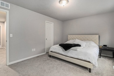 Welcome to this spacious 4-bedroom, 2.5-bath set on nearly half on Lake Doster Golf Club in Michigan - for sale on GolfHomes.com, golf home, golf lot