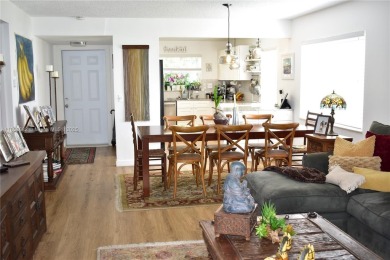 Large 1st Floor corner unit.  Privateplete impact glass on Sunrise Lakes Phase III in Florida - for sale on GolfHomes.com, golf home, golf lot