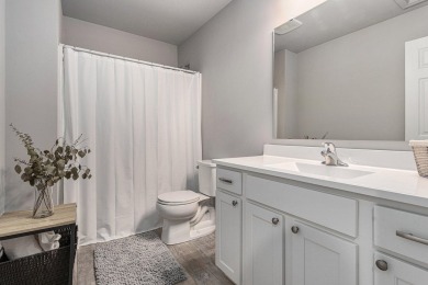 Welcome to this spacious 4-bedroom, 2.5-bath set on nearly half on Lake Doster Golf Club in Michigan - for sale on GolfHomes.com, golf home, golf lot
