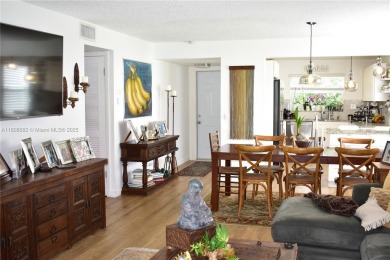 Large 1st Floor corner unit.  Privateplete impact glass on Sunrise Lakes Phase III in Florida - for sale on GolfHomes.com, golf home, golf lot