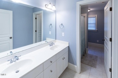 Welcome to this beautifully maintained 4 bedroom, 2.5 bath home on Heritage Golf Club in North Carolina - for sale on GolfHomes.com, golf home, golf lot