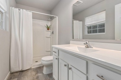 Welcome to this spacious 4-bedroom, 2.5-bath set on nearly half on Lake Doster Golf Club in Michigan - for sale on GolfHomes.com, golf home, golf lot