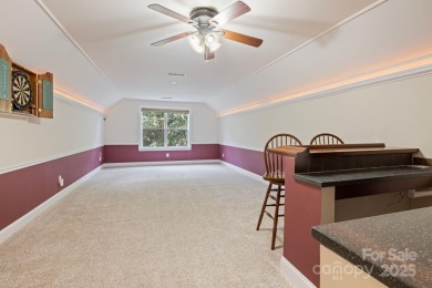 Situated on a coveted corner lot beside the 17th green in Olde on Olde Sycamore Golf Plantation in North Carolina - for sale on GolfHomes.com, golf home, golf lot