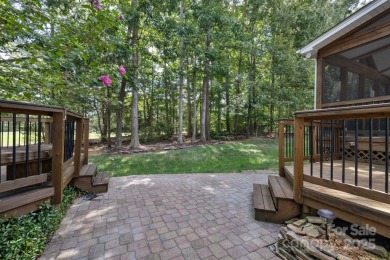 Situated on a coveted corner lot beside the 17th green in Olde on Olde Sycamore Golf Plantation in North Carolina - for sale on GolfHomes.com, golf home, golf lot