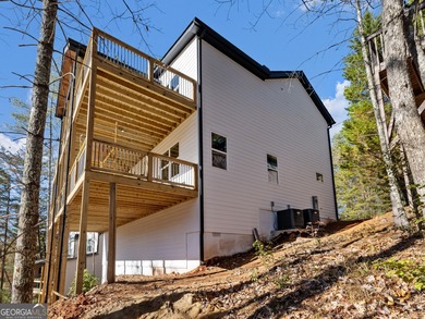 Come tour this beautifully finished new construction home in on Innsbruck Resort and Golf Club in Georgia - for sale on GolfHomes.com, golf home, golf lot