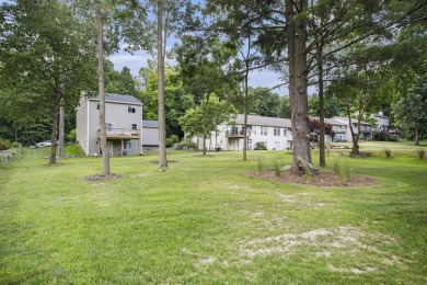 Welcome to this spacious 4-bedroom, 2.5-bath set on nearly half on Lake Doster Golf Club in Michigan - for sale on GolfHomes.com, golf home, golf lot