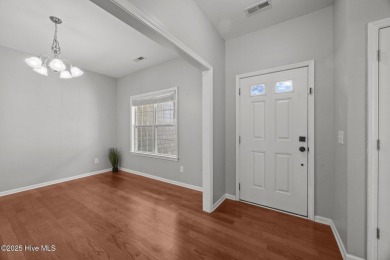 Hard floors throughout the home, vaulted ceilings and a huge on Belvedere Country Club in North Carolina - for sale on GolfHomes.com, golf home, golf lot