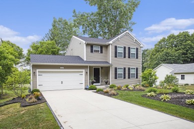 Welcome to this spacious 4-bedroom, 2.5-bath set on nearly half on Lake Doster Golf Club in Michigan - for sale on GolfHomes.com, golf home, golf lot