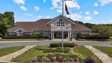 Situated on a coveted corner lot beside the 17th green in Olde on Olde Sycamore Golf Plantation in North Carolina - for sale on GolfHomes.com, golf home, golf lot