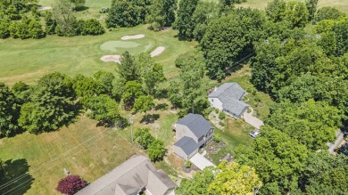 Welcome to this spacious 4-bedroom, 2.5-bath set on nearly half on Lake Doster Golf Club in Michigan - for sale on GolfHomes.com, golf home, golf lot