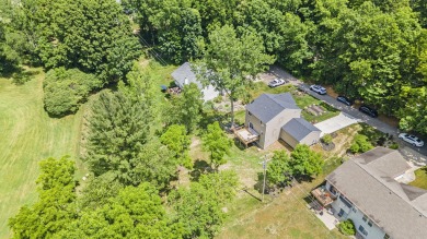 Welcome to this spacious 4-bedroom, 2.5-bath set on nearly half on Lake Doster Golf Club in Michigan - for sale on GolfHomes.com, golf home, golf lot