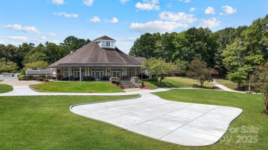 Situated on a coveted corner lot beside the 17th green in Olde on Olde Sycamore Golf Plantation in North Carolina - for sale on GolfHomes.com, golf home, golf lot