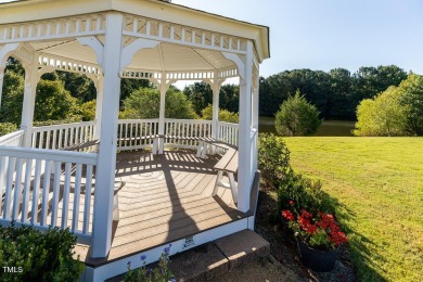 Welcome to this beautifully maintained 4 bedroom, 2.5 bath home on Heritage Golf Club in North Carolina - for sale on GolfHomes.com, golf home, golf lot