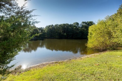 Welcome to this beautifully maintained 4 bedroom, 2.5 bath home on Heritage Golf Club in North Carolina - for sale on GolfHomes.com, golf home, golf lot