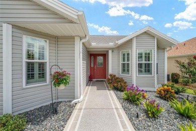 Welcome to this beautifully enhanced Wisteria model, where on Glenview Championship Golf and Country Club in Florida - for sale on GolfHomes.com, golf home, golf lot