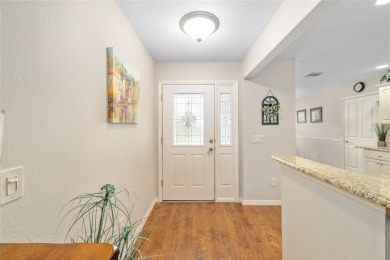 Welcome to this beautifully enhanced Wisteria model, where on Glenview Championship Golf and Country Club in Florida - for sale on GolfHomes.com, golf home, golf lot