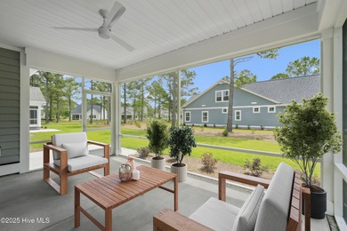 Discover the Skiff, a beautiful new Logan Home, located in on Sea Trail Golf Resort in North Carolina - for sale on GolfHomes.com, golf home, golf lot