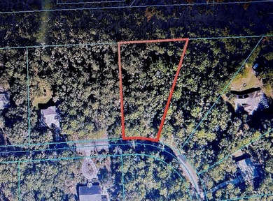 This 1.25 Acre wooded lot is located in a highly desired Rainbow on Juliette Falls Golf and Spa Club in Florida - for sale on GolfHomes.com, golf home, golf lot